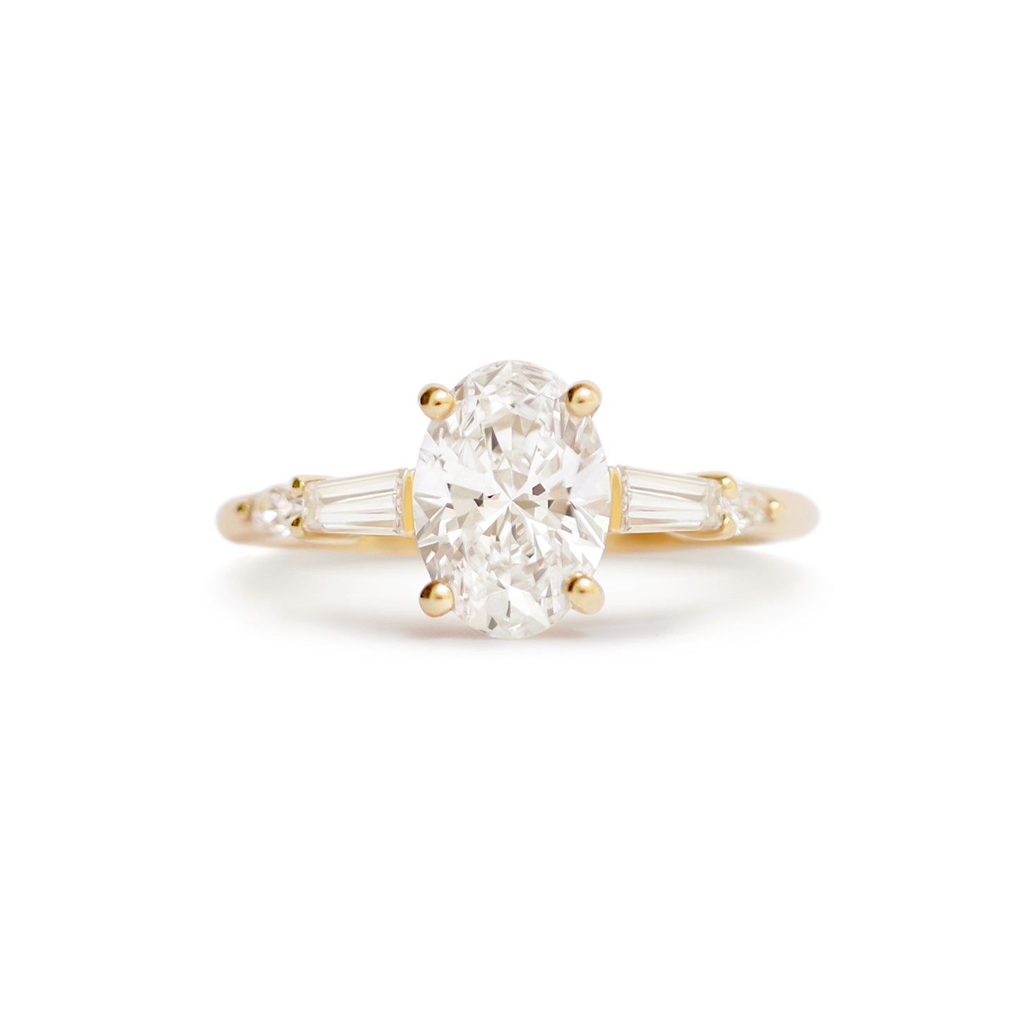 Oval Baguette & Pear Diamond Ring