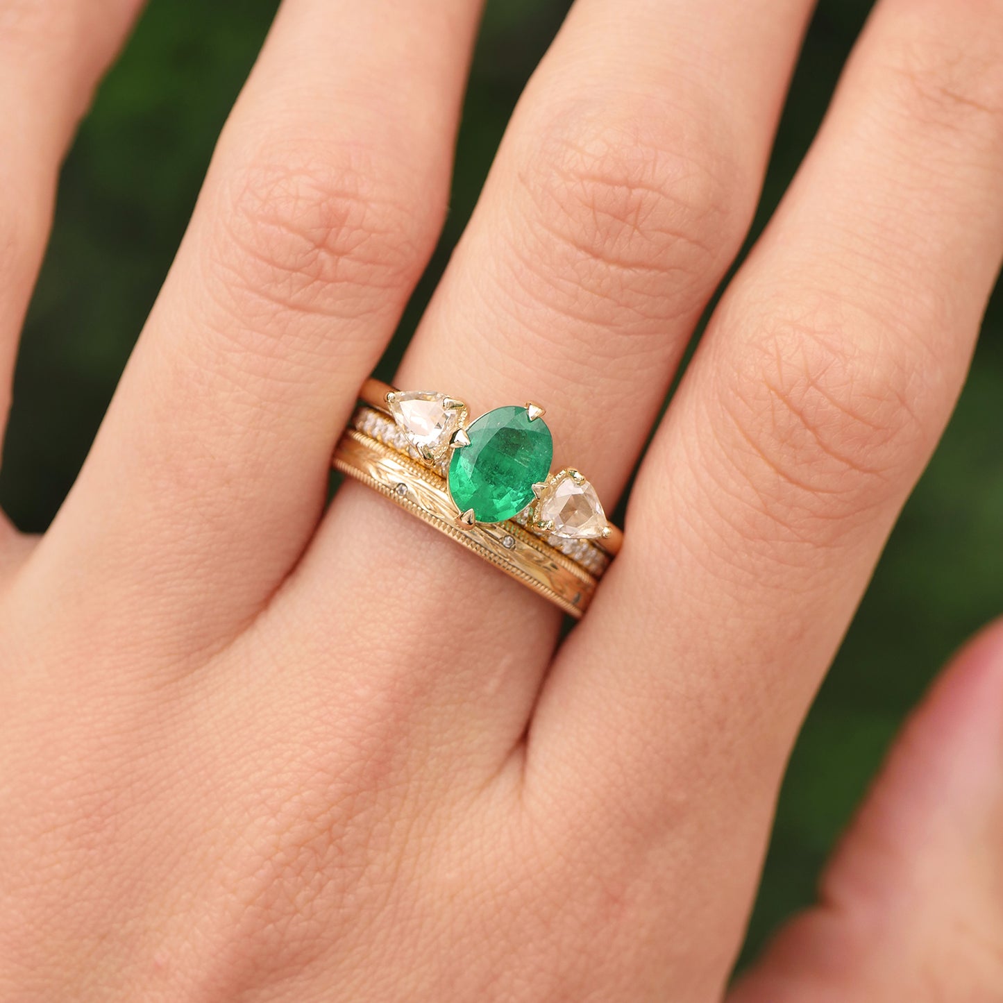 Oval Emerald & Trillion Diamond Ring