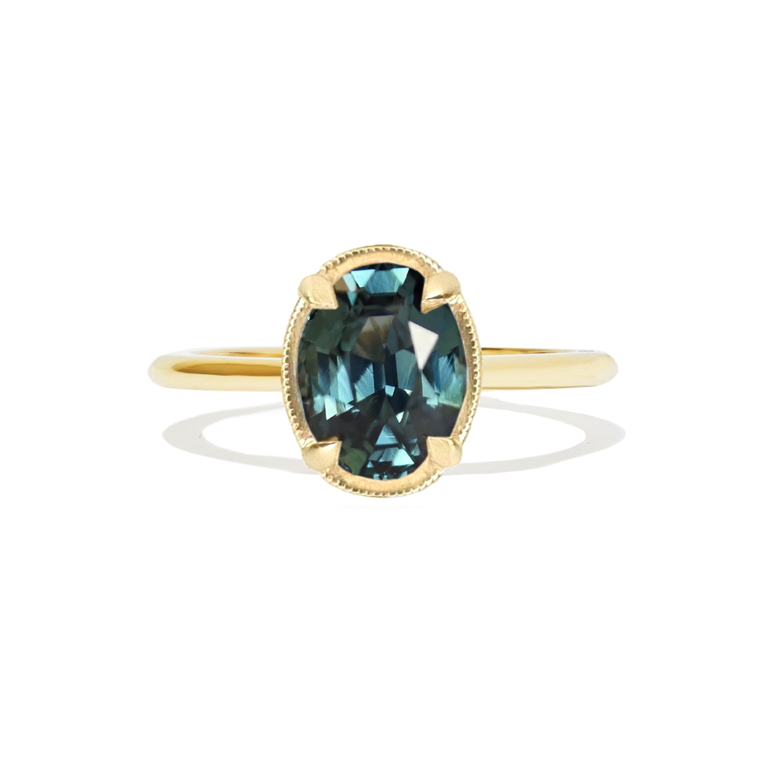 Oval Teal Sapphire Solitaire Ring
