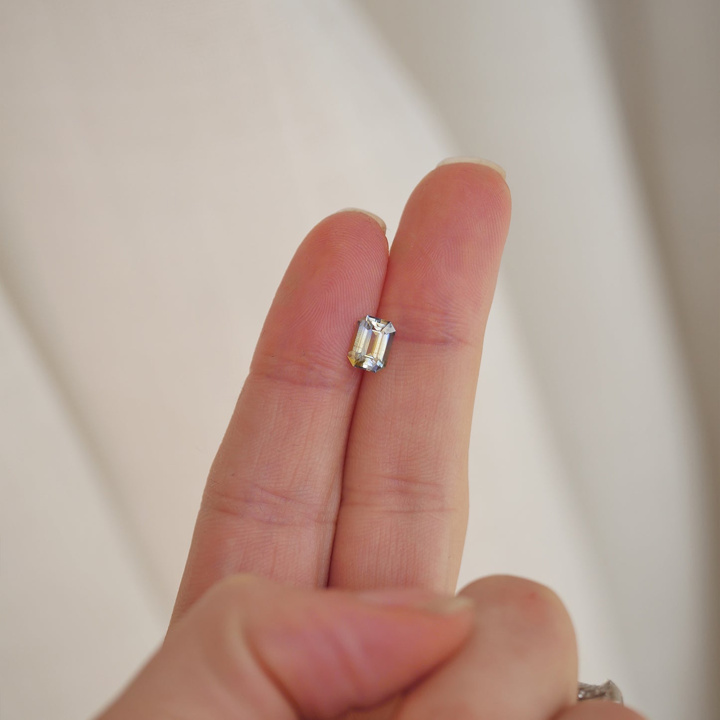 1.20 ctw Emerald Cut Bi Color Sapphire