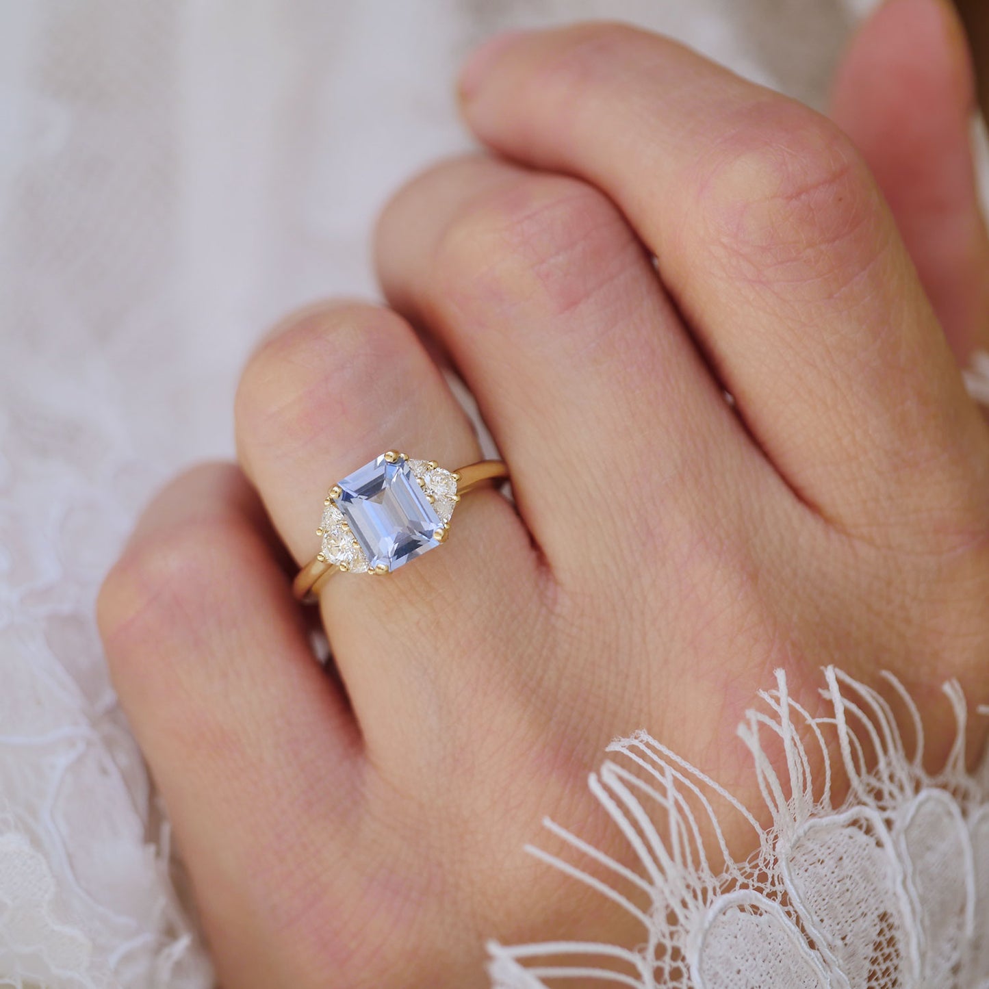Light Blue Sapphire & Trillion Three Stone Engagement Ring
