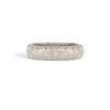 A 5mm wide 14k white gold wedding band.