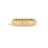 A 5mm wide gold band with floral engraved design.