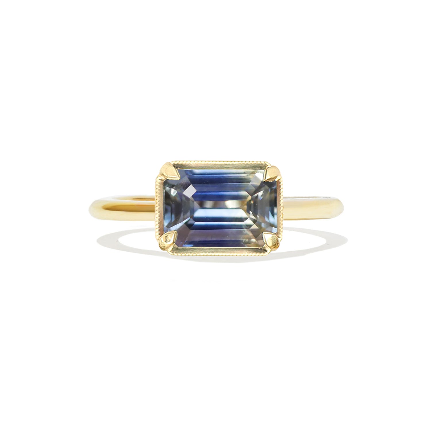 Bi-color Blue and yellow east west sapphire engagement solitaire ring