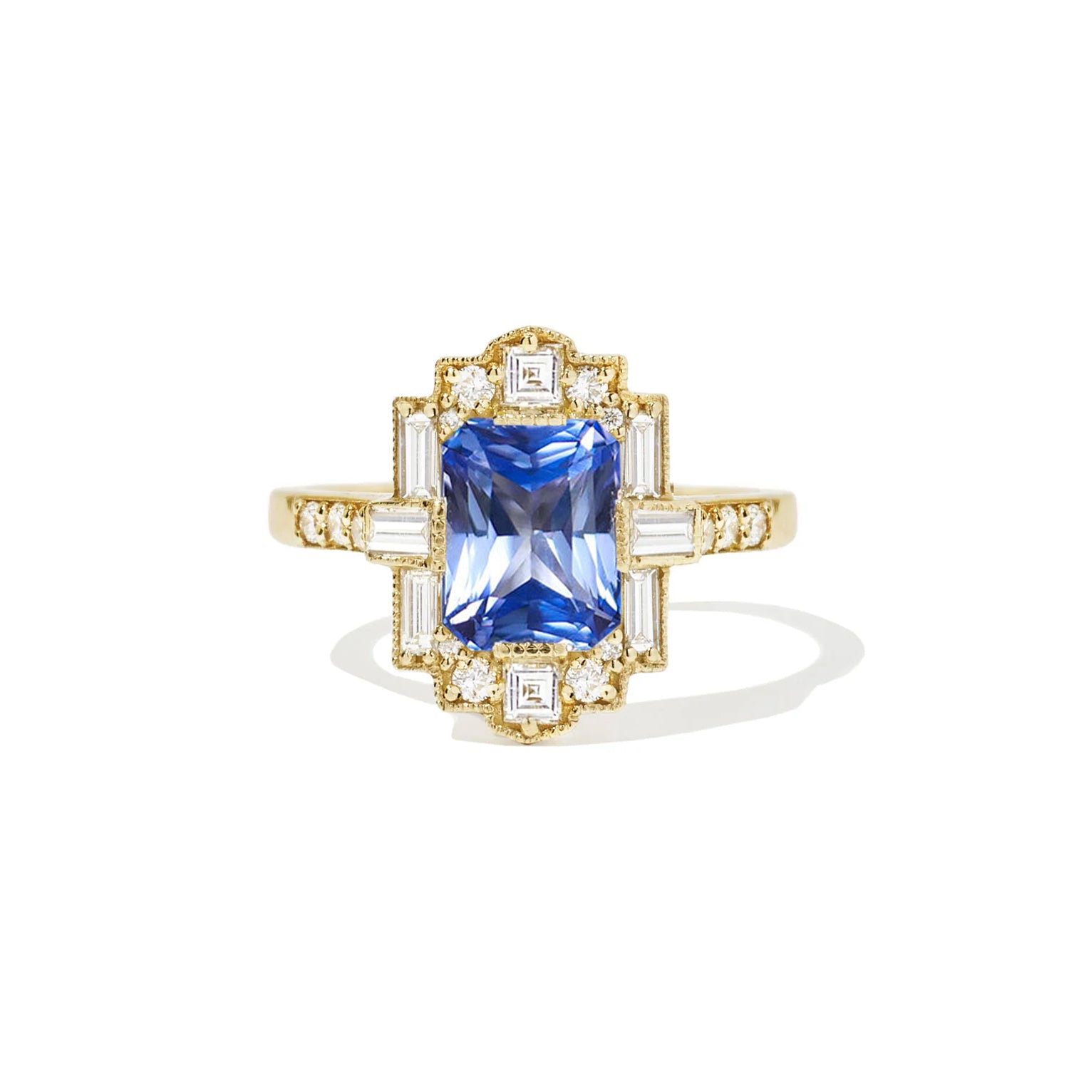 Art Deco inspired blue radiant cut sapphire and diamond engagement ring