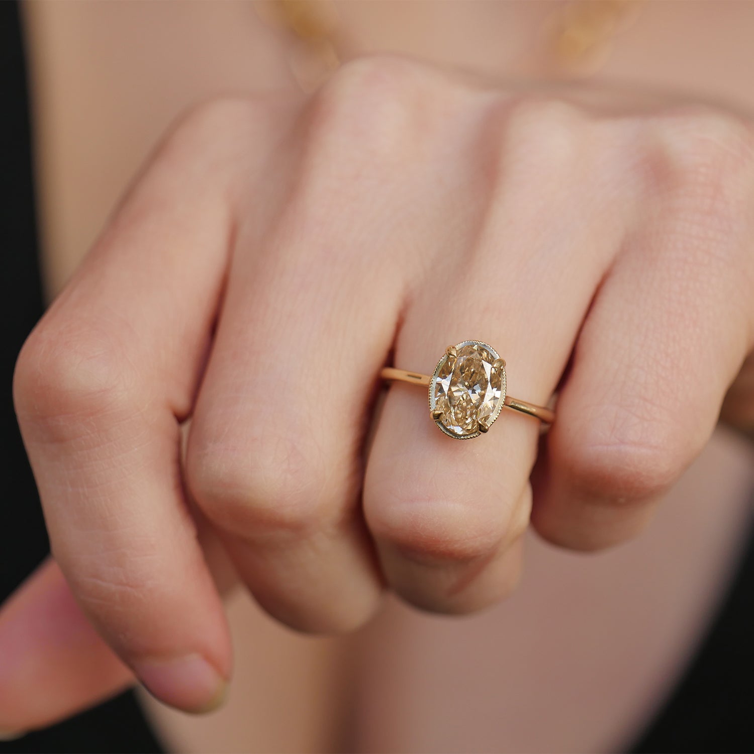 Vintage inspired champagne oval engagement ring