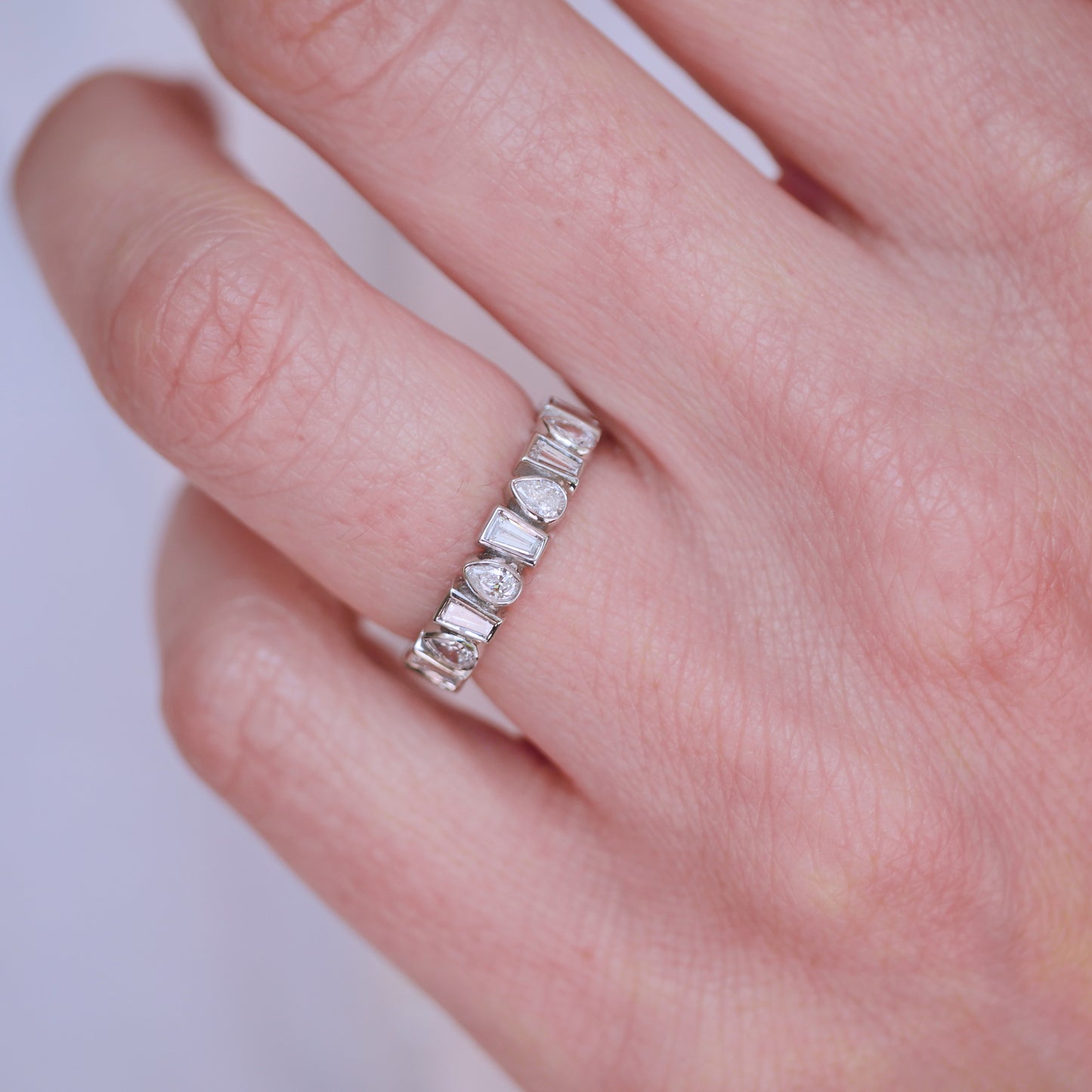 Custom Bezel Baguette and Pear Eternity Band