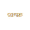 A leaf inspired ring with a series of round brilliant cut diamonds set in 14k yellow gold.