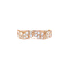 A leaf inspired band with a series of round brilliant cut diamonds set in 14k yellow gold.