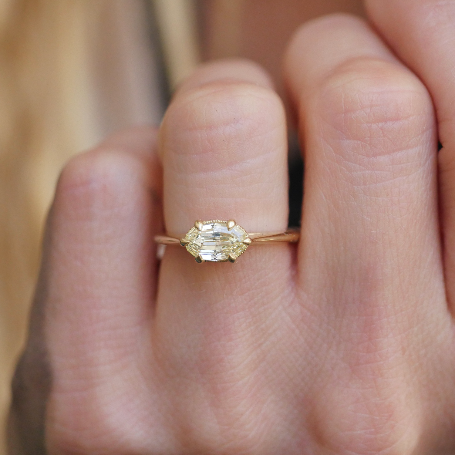 Oval diamond east west setting deals