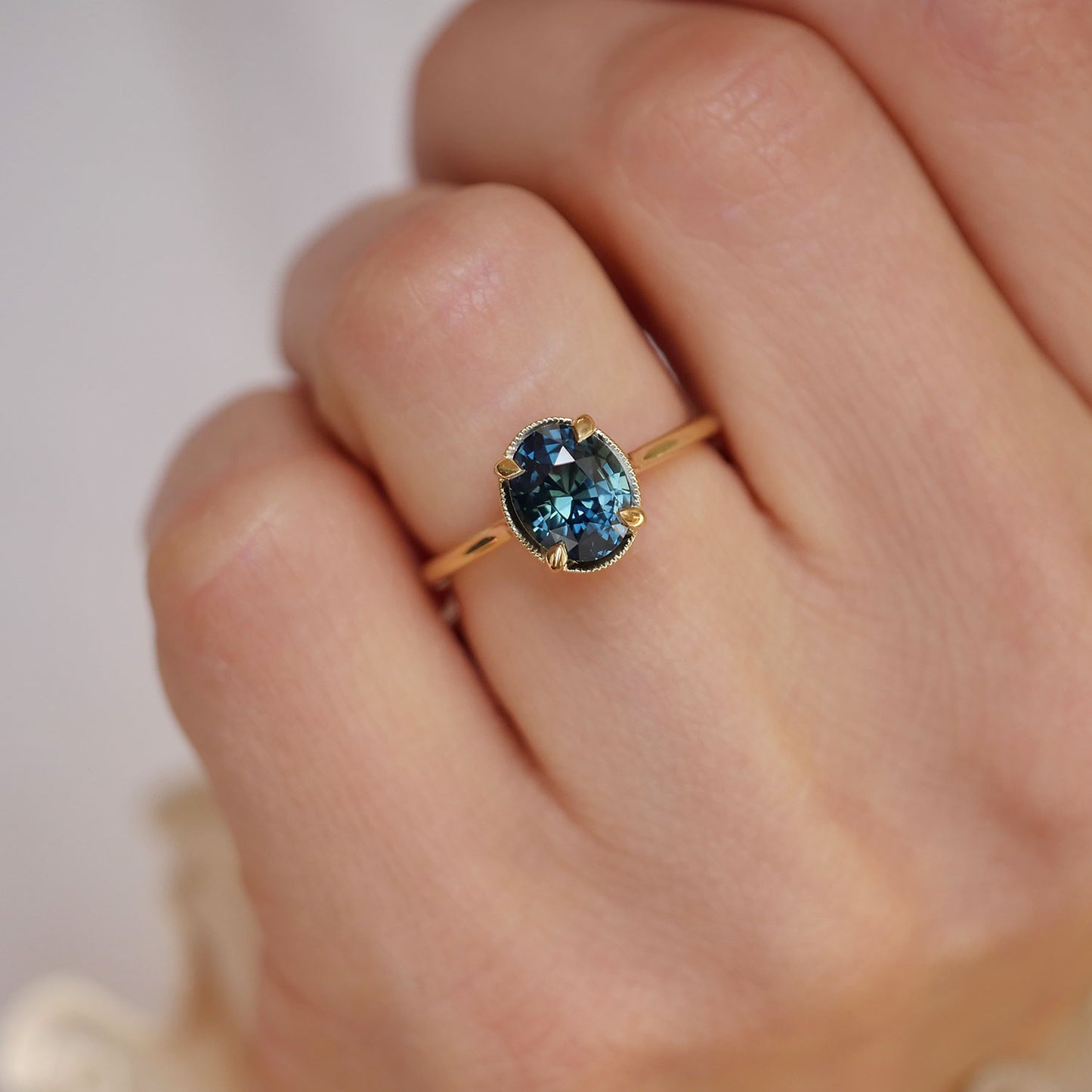 Oval Teal Sapphire Solitaire Ring