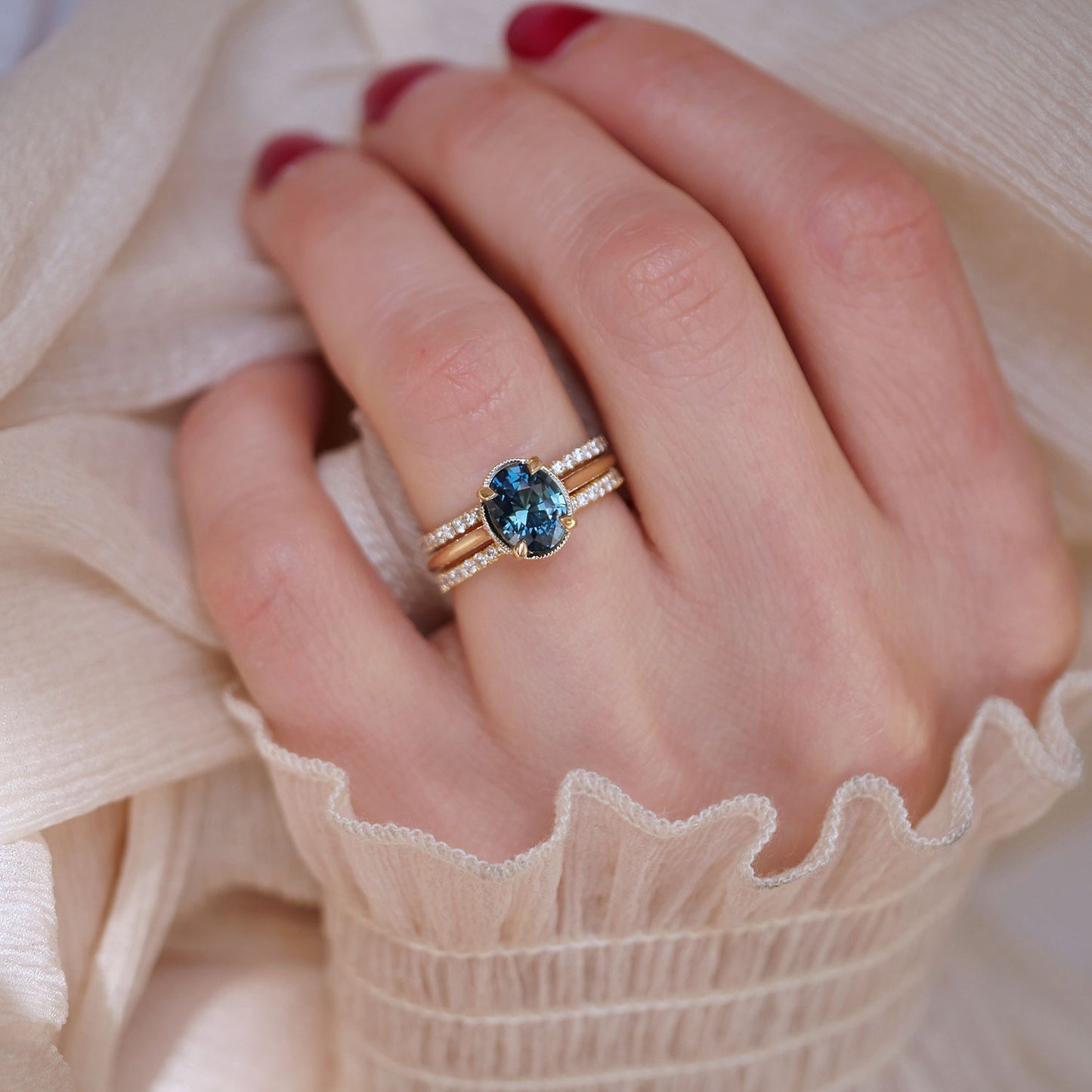 Oval Teal Sapphire Solitaire Ring