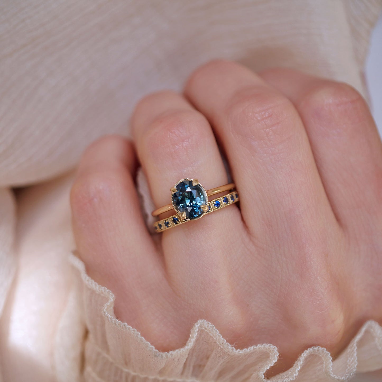 Oval Teal Sapphire Solitaire Ring