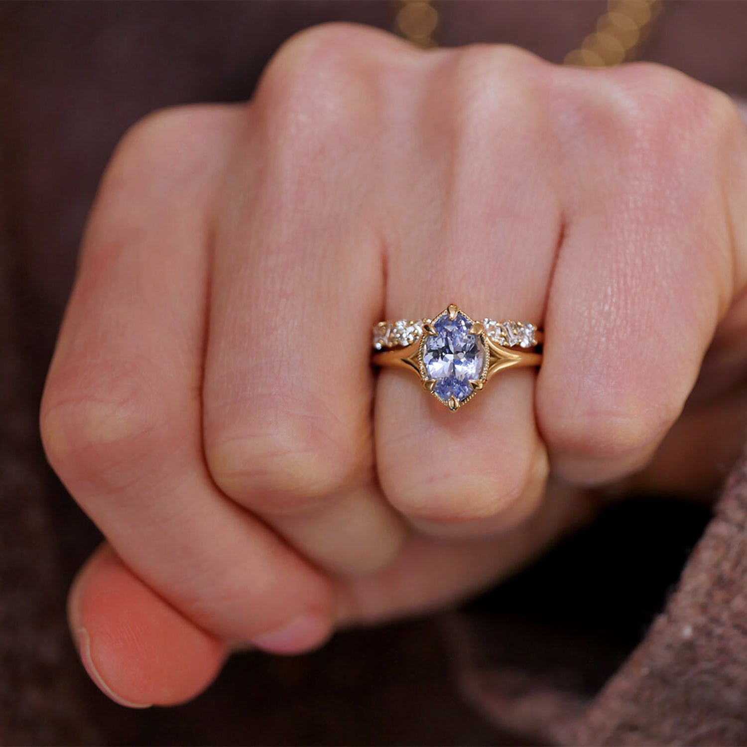 marquise shaped sapphire engagement ring and diamond wedding band