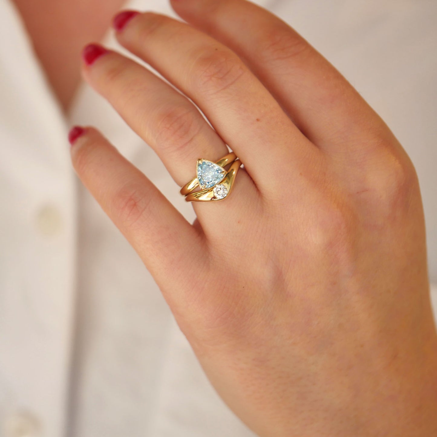Custom Blue Diamond Solitaire and Contour Band
