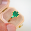Emerald Bezel Trio Engagement Ring