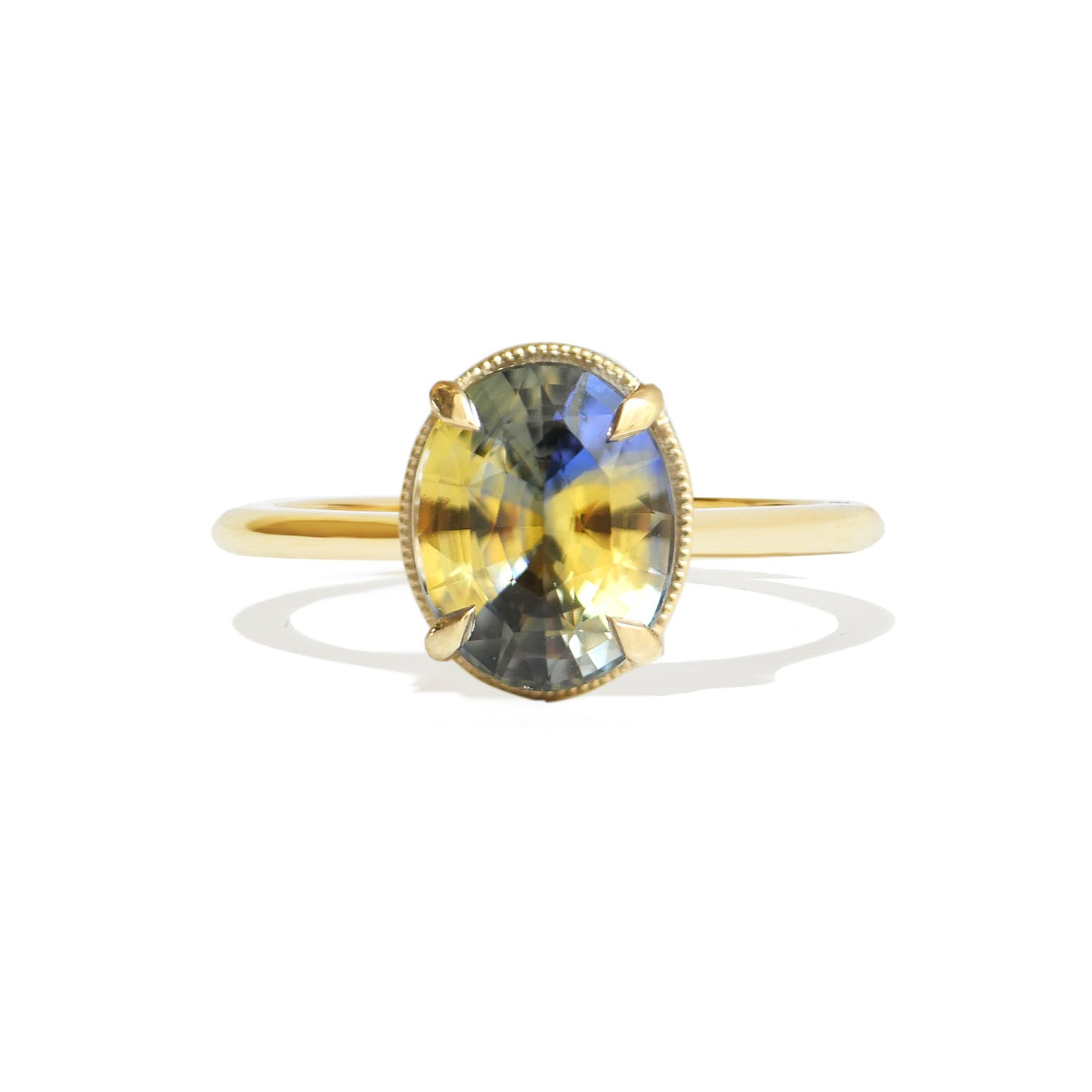 Oval Parti Blue Sapphire Solitaire Ring