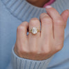 Featuring a dazzling emerald cut lab-grown diamond in a split shank setting, this engagement ring is paired with a matching diamond stacking band, creating a perfect blend of contemporary elegance and timeless sparkle.