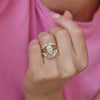 A unique and one of a kind marquise split shank solitaire is stacked with a sparkling and eye catching diamond contour wedding band.