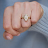 Featuring a marquise cut diamond in a split shank solitaire setting, this engagement ring will create a refined and sparkling bridal ensemble.