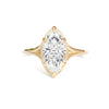 A stunning lab-grown marquise cut diamond sits in a split shank solitaire setting, creating brilliance and elegance of the entire set.