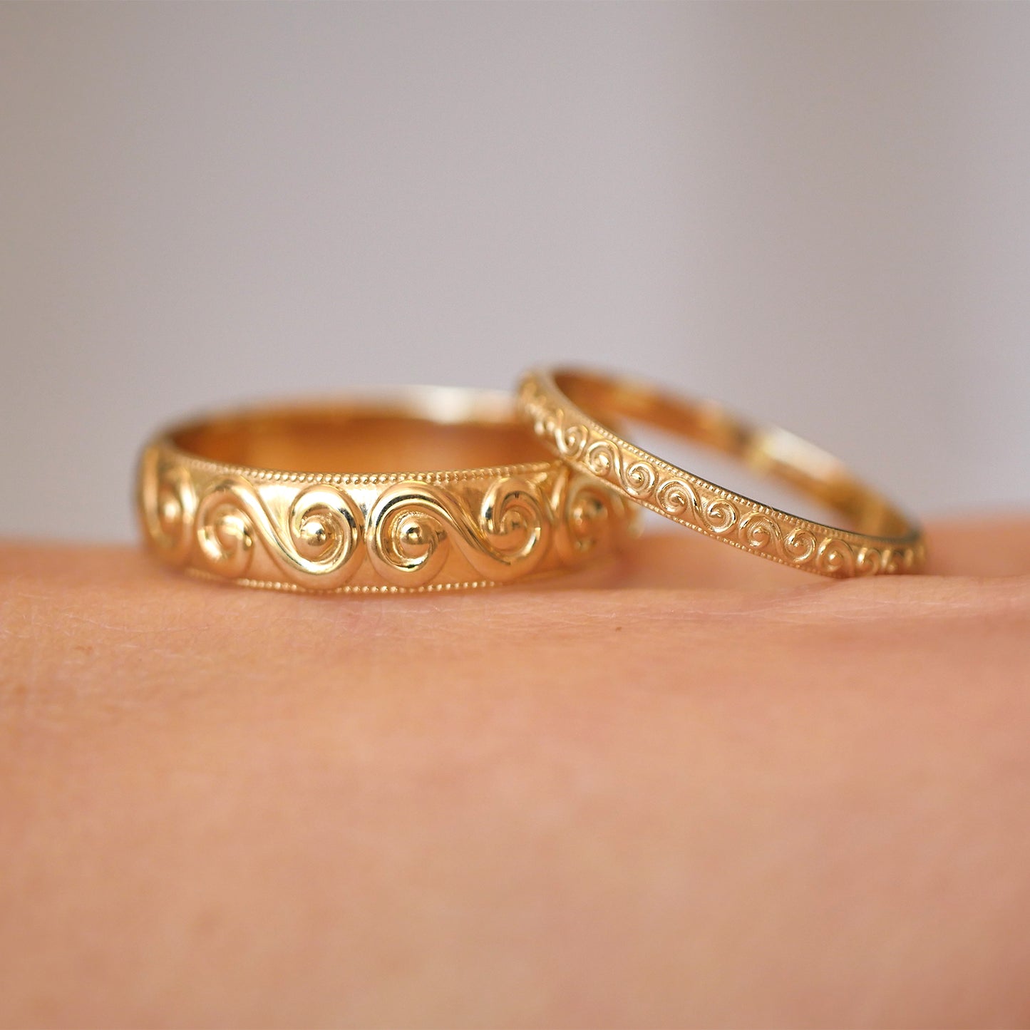 14k yellow gold wind spiral wide and delicate wedding bands 