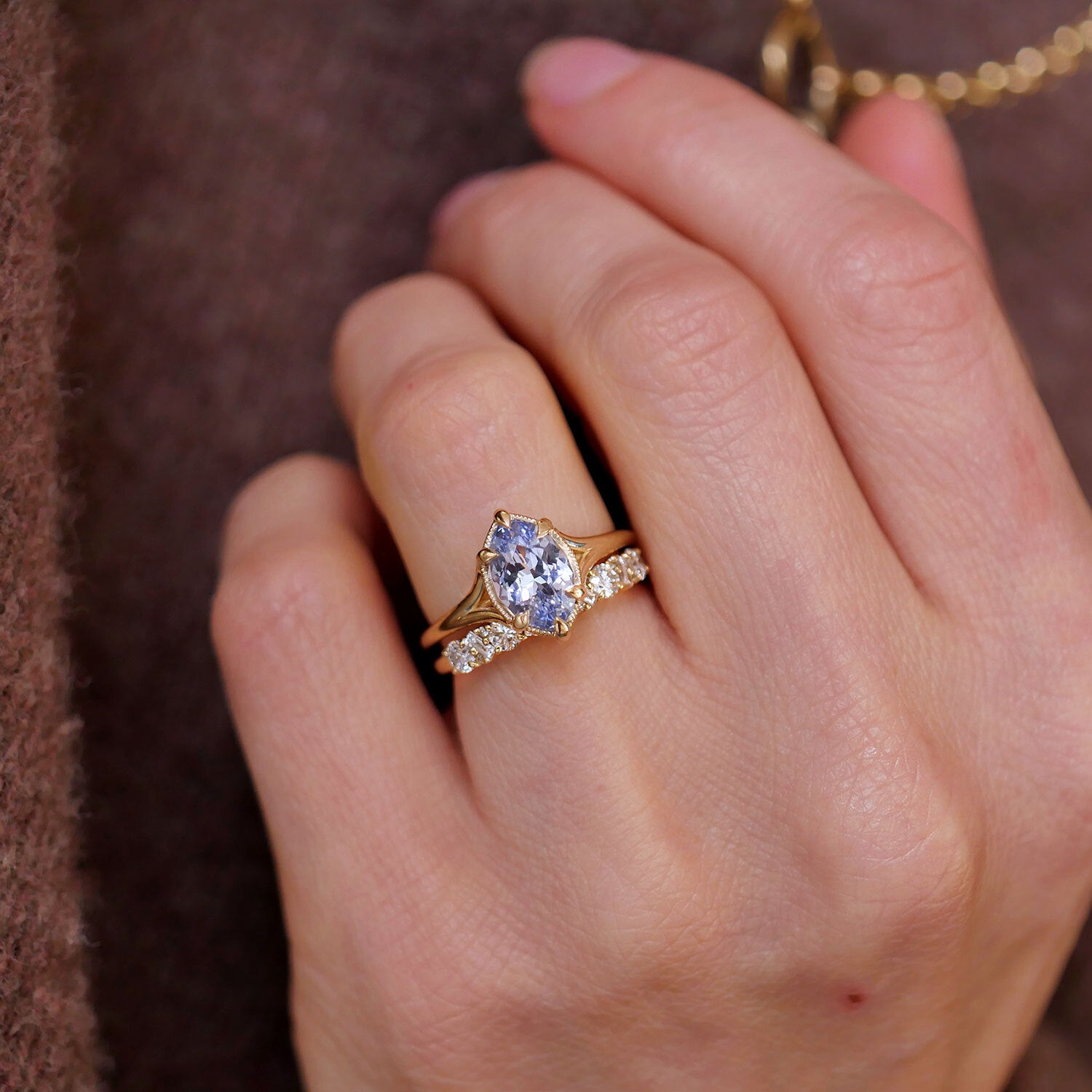 marquise_sapphire_split_shank_solitaire_ring_with_diamond_wedding_anniversary_band