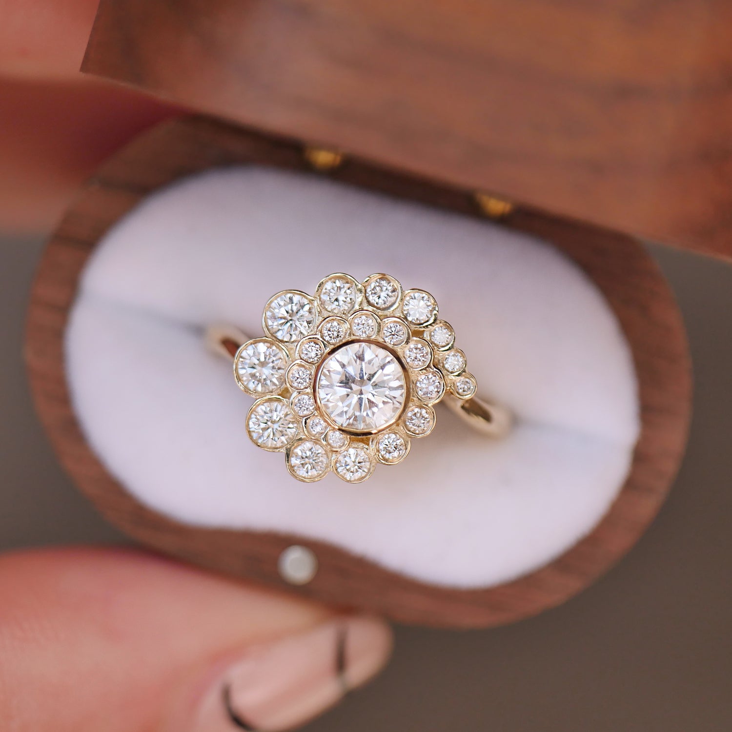 vintage wooden box featuring one a kind engagement ring with lab diamonds in a spiral design