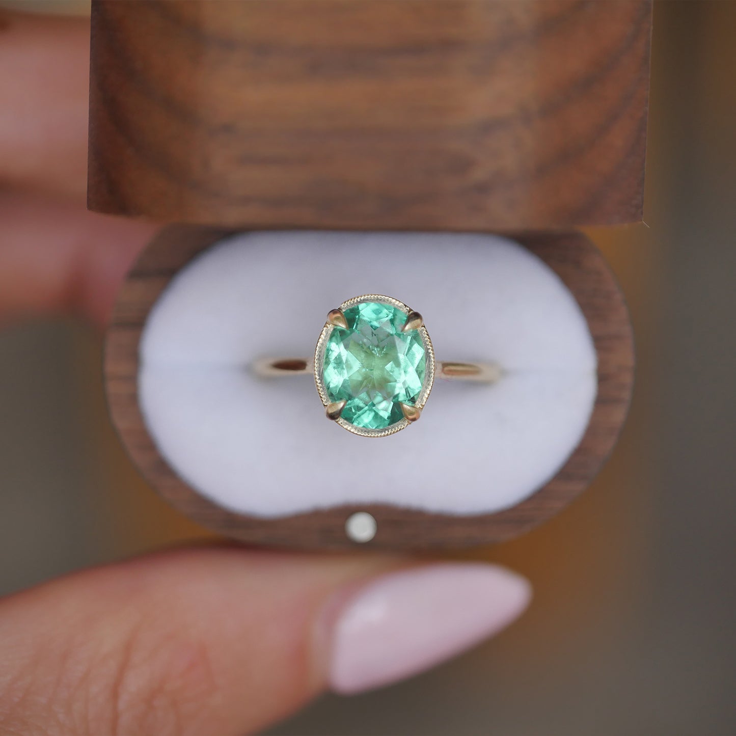 Mint Emerald Oval Solitaire