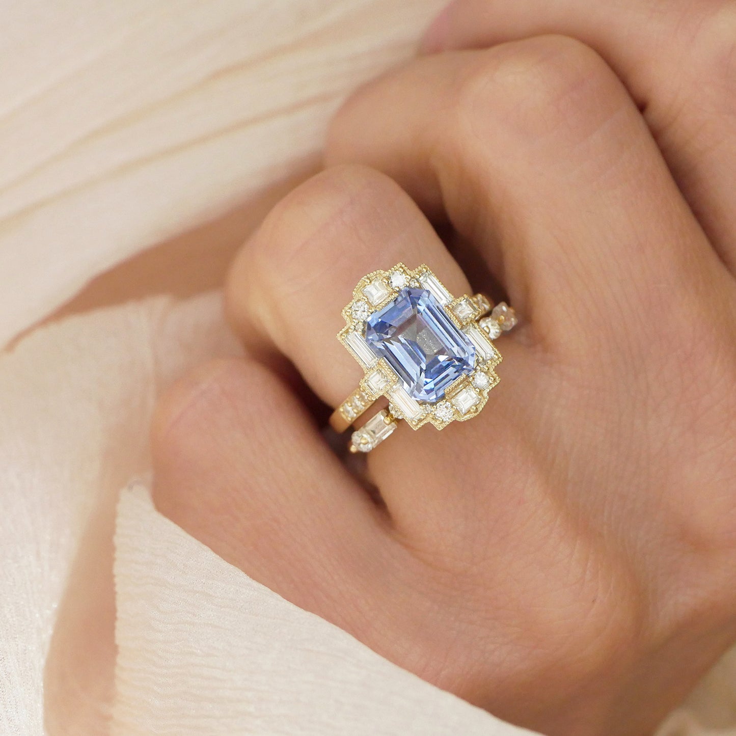 Sky Blue Emerald Cut Sapphire Deco Halo Diamond Ring