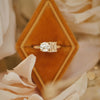 With its elegant pairing of a champagne and round diamond, this toi et moi ring is a beautiful expression of a love that is both unique and enduring.