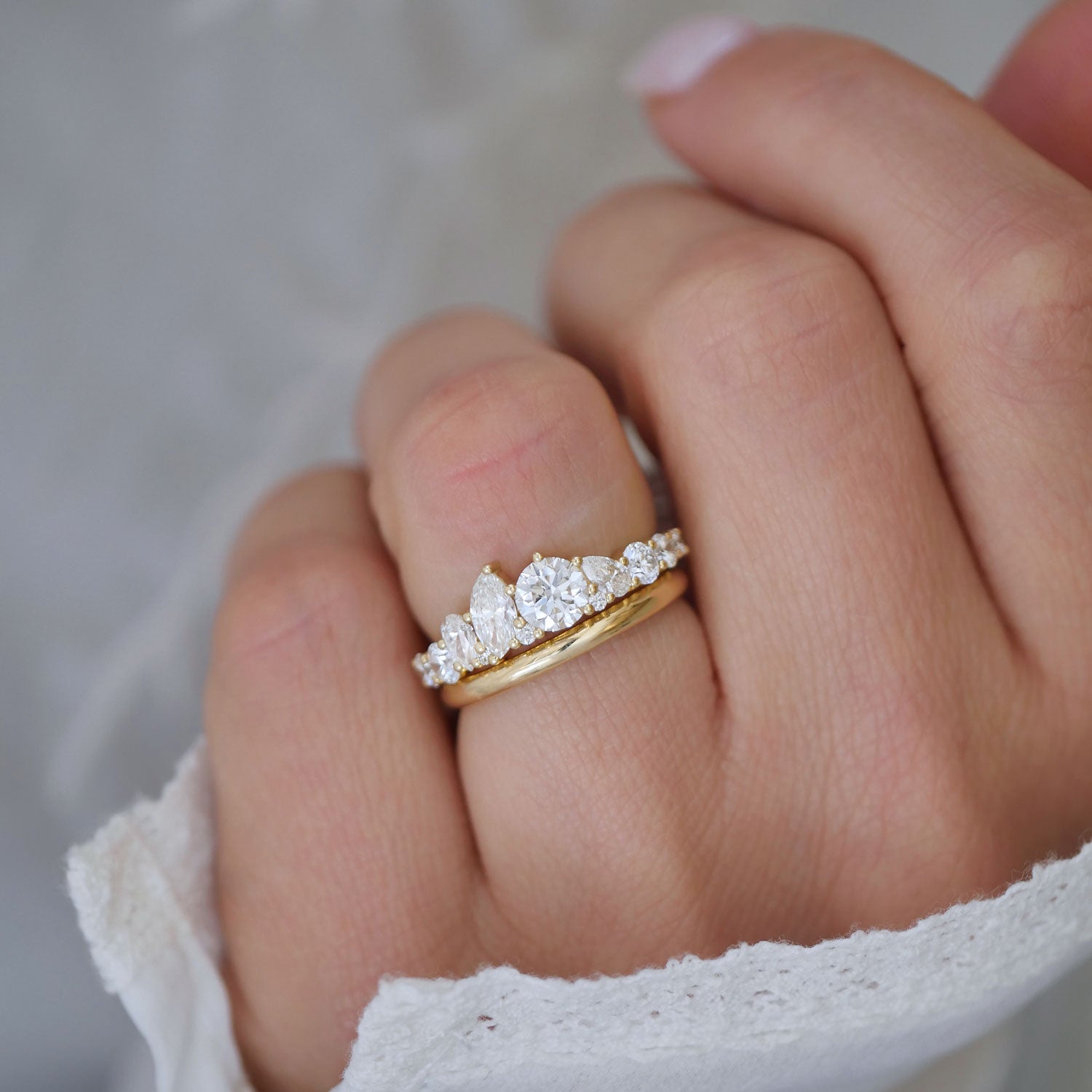 The Firework Diamond Mosaic Band with Marquise and Round diamonds is a symbol of celebration, perfect for marking a special occasion with brilliance and elegance.