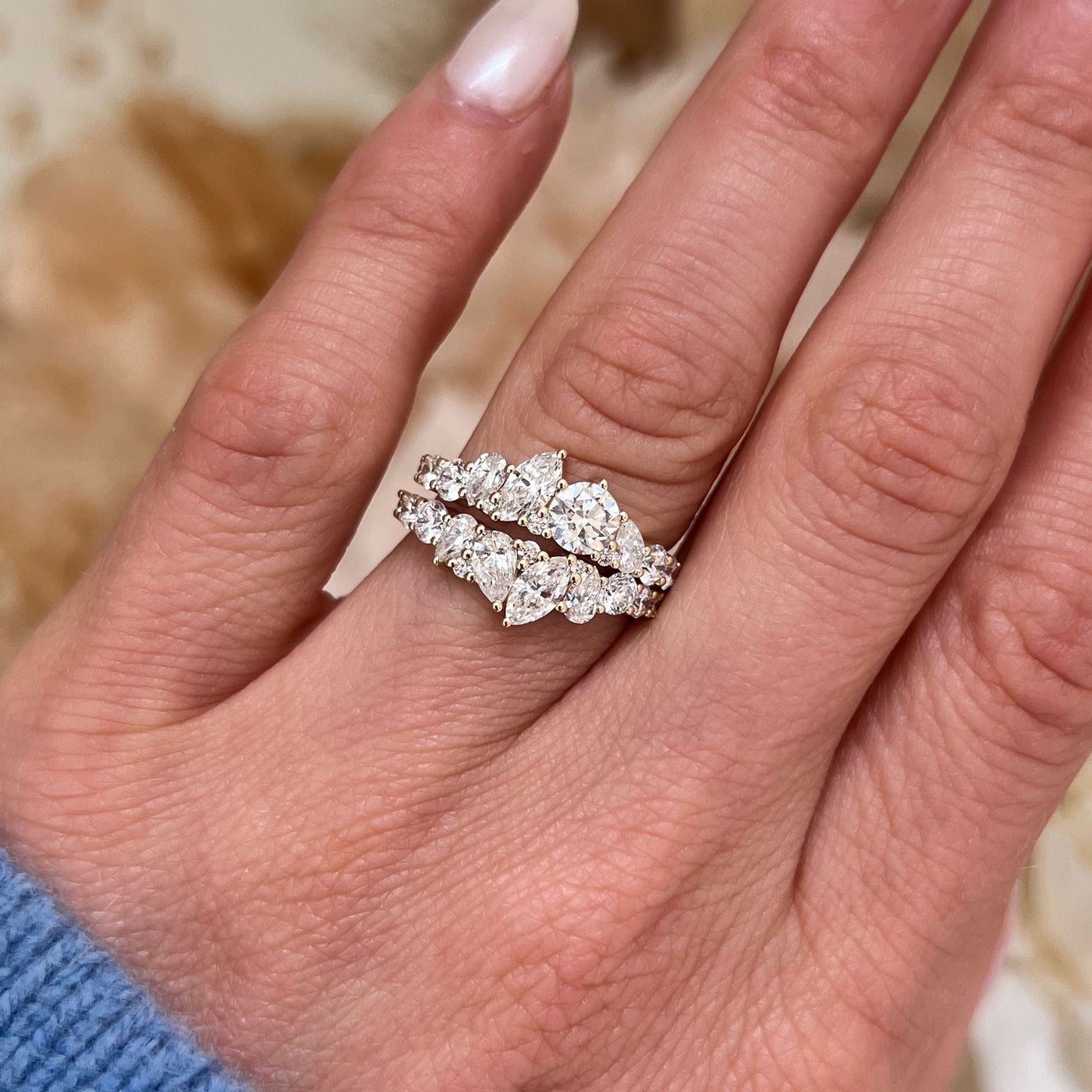 Each diamond in the Firework Mosaic Band is meticulously set to create a stunning, radiant effect that brings out the natural sparkle of the marquise and round cuts.