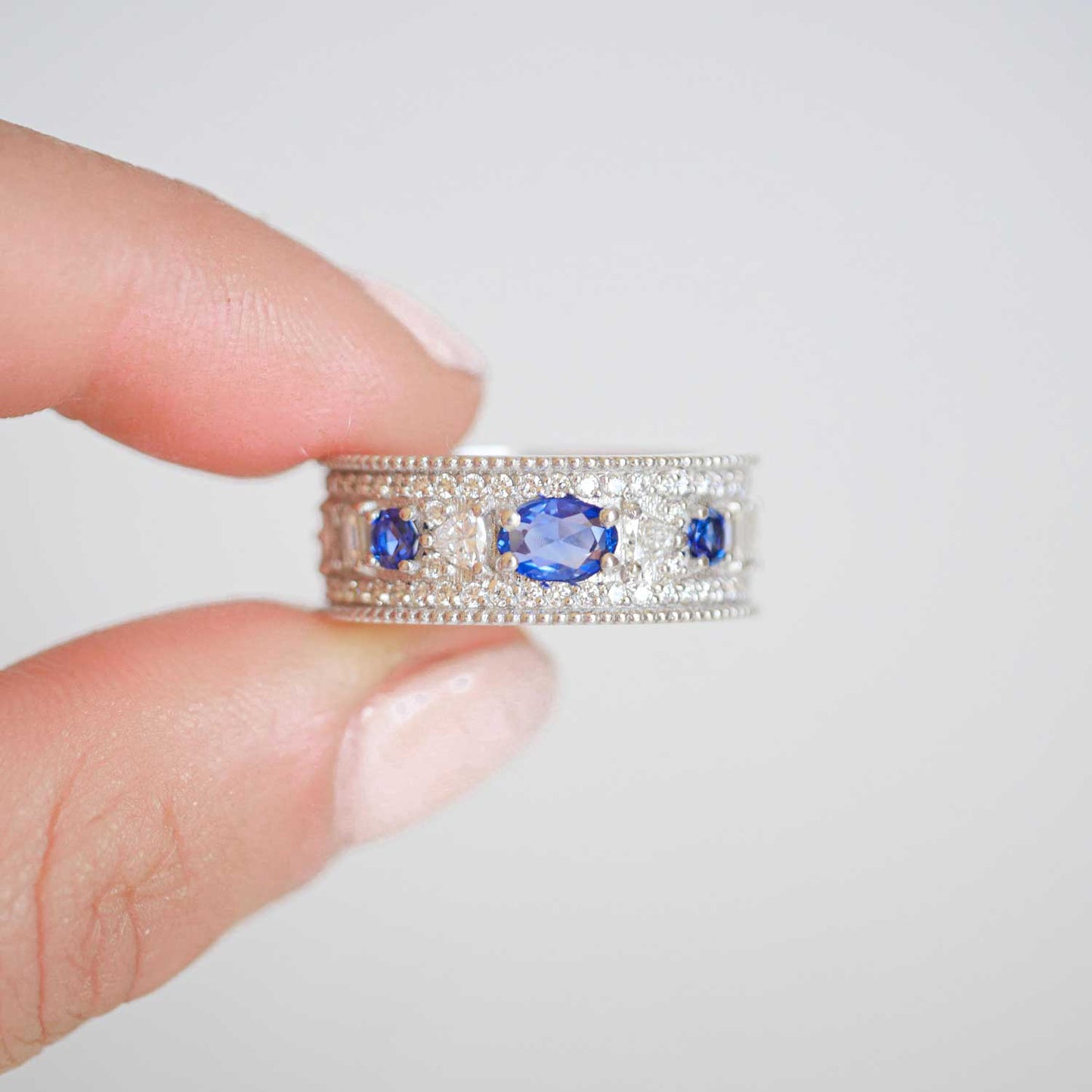 East West Oval Rose Cut Ring with 3/4 diamond pattern & Cylon Sapphires