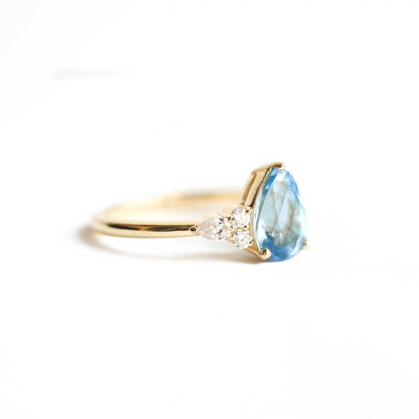Aquamarine, Pear, and Round Diamond Engagement Ring