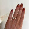 The rich, warm tone of the champagne pear diamond in this toi et moi ring creates a luxurious and romantic look, perfect for those seeking a unique twist on a classic symbol of love.