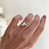 This ring features a mesmerizing pear-shaped champagne diamond, exuding warmth and elegance, making it a perfect symbol of two souls intertwined in love and harmony.